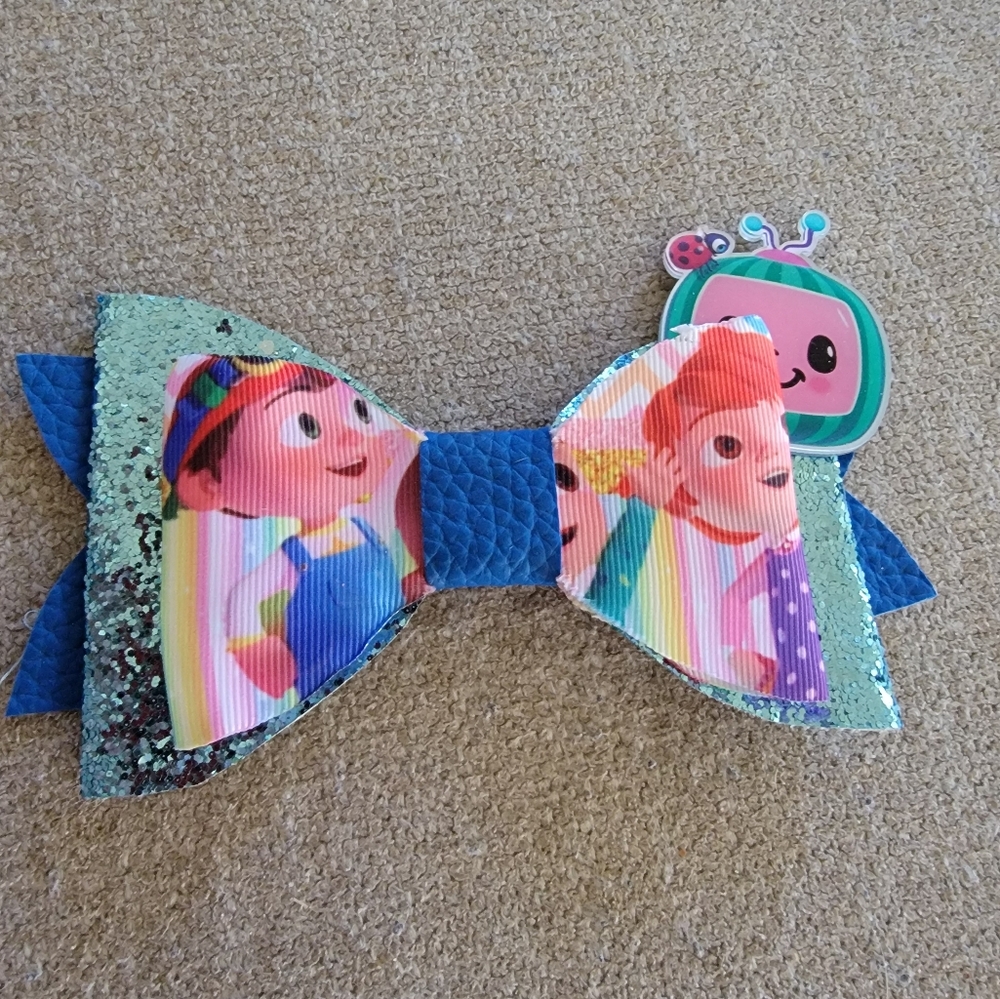 * cocomelon handmade bow from boutique, 1 of a kind, never worn